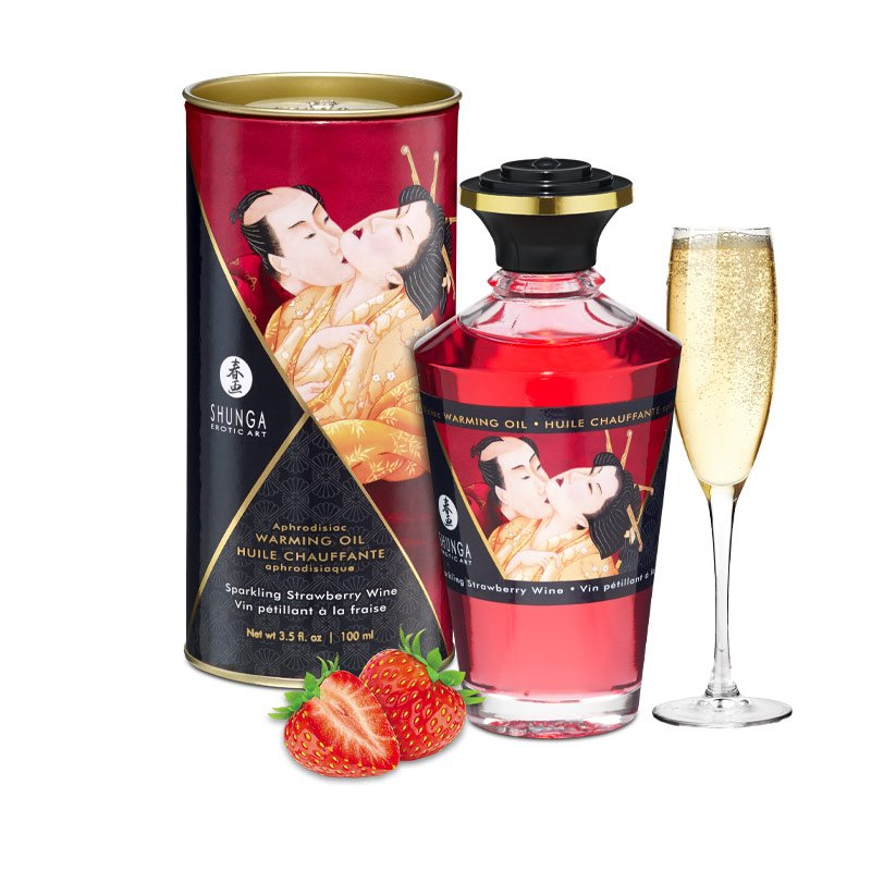 Shunga Blazing Cherry Edible Warming Massage Oil bottle with strawberries and champagne.