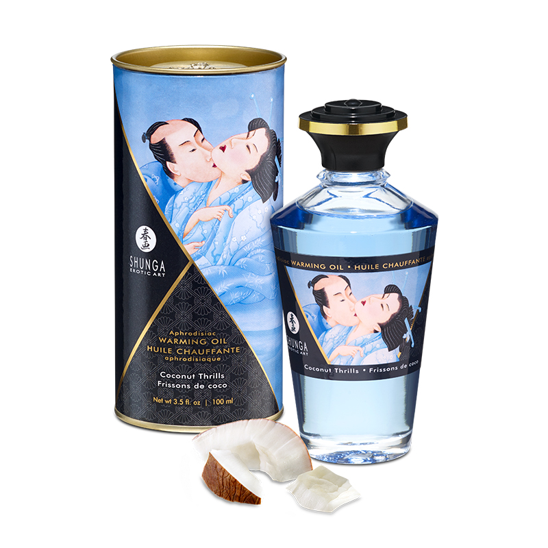 Shunga Coconut Thrills warming massage oil in a bottle and tube with Japanese art.