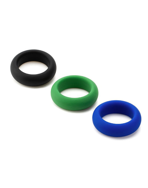 Three silicone rings in black, green, and blue.