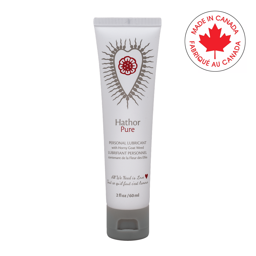 Hathor Pure personal lubricant in a white tube with a red heart design and a "Made in Canada" emblem.