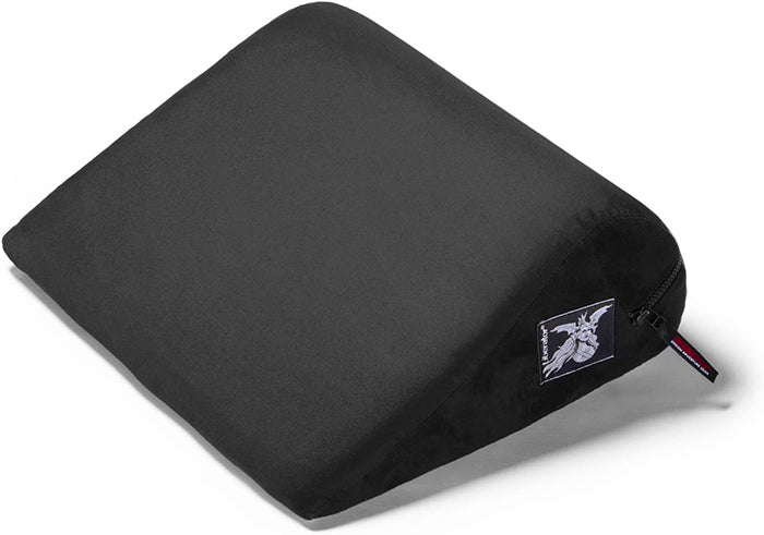 Black Jaz Petite Support Bolster positioning pillow with a logo patch.