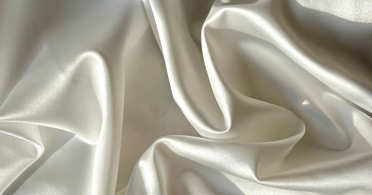Smooth flowing white silk — body-safe vibrator materials guide for Canadian shoppers