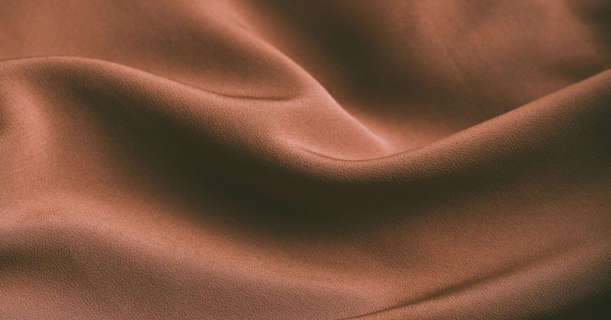 Draped brown silk seen from above — Pipedream Canada buying guide 2026 from Red Pleasures
