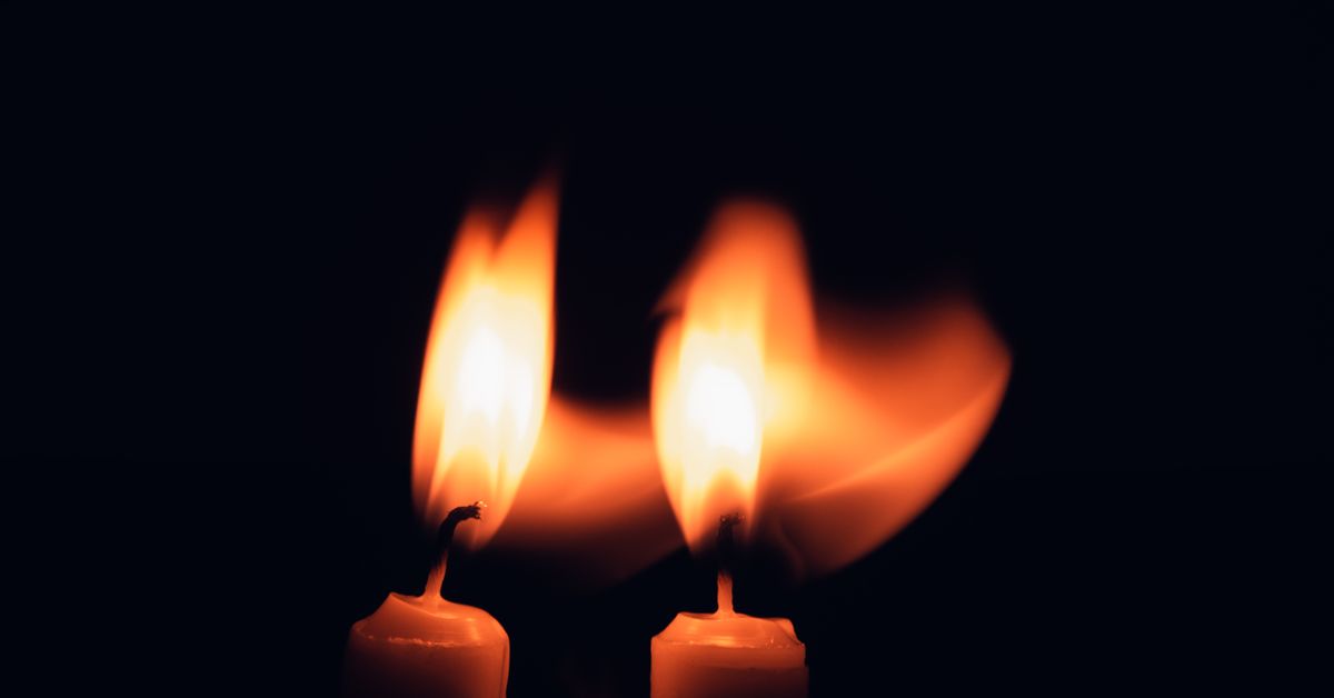 Mutual masturbation for couples guide — two candles burning side by side, Red Pleasures Canada