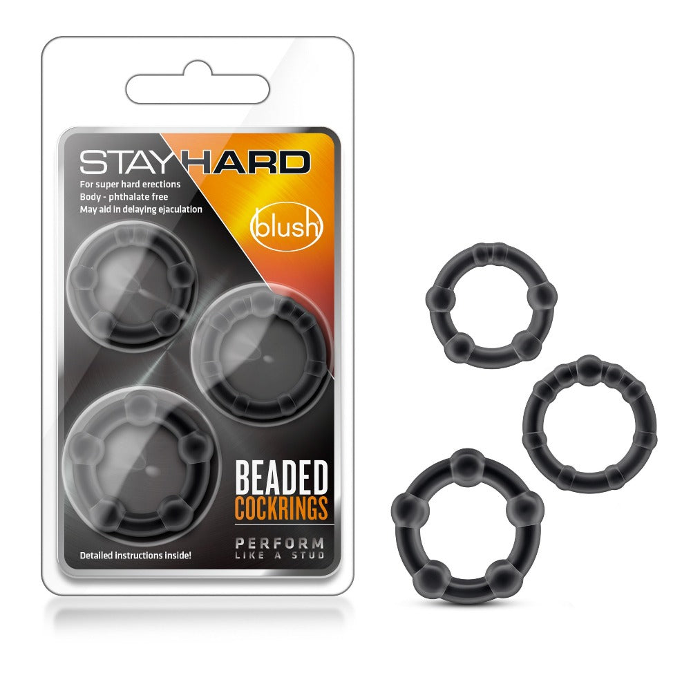 Three black beaded cock rings in packaging and loose.