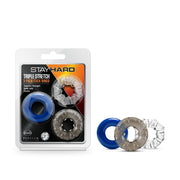 Three elastic cock rings in blue, gray, and clear.