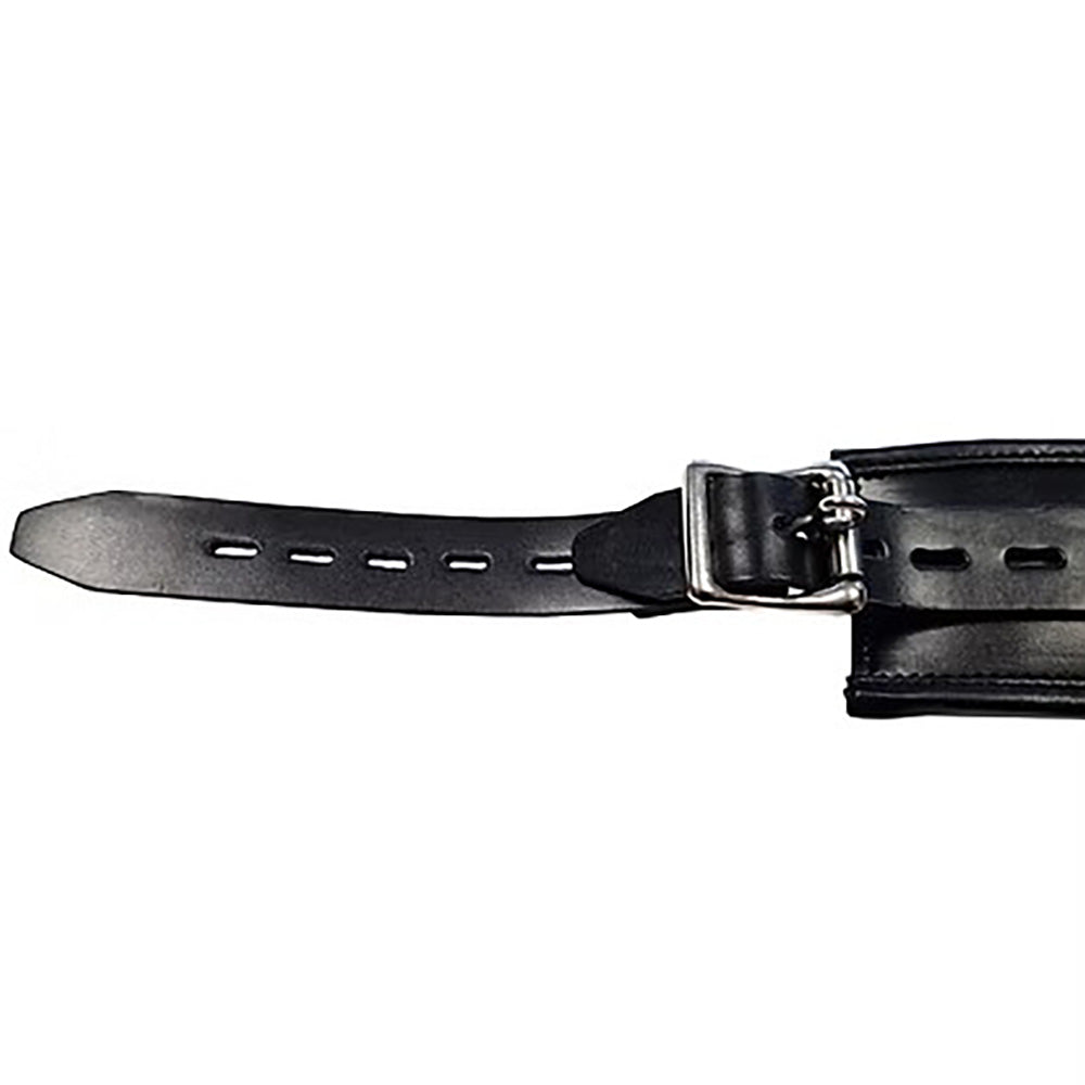 Black leather cuff extender with silver buckle and holes.