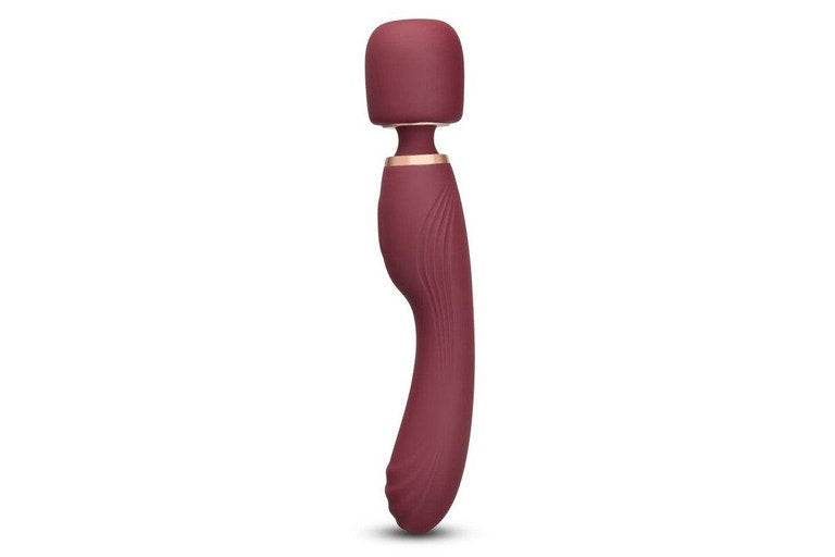 A maroon vibrating wand with a rounded head and curved handle.