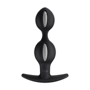 Black weighted anal plug with two inner rolling balls and a flared base.