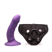 Purple silicone dildo and black strap-on harness kit.