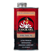A 9 oz can of Cock Oil water-based personal lubricant with a rooster graphic.