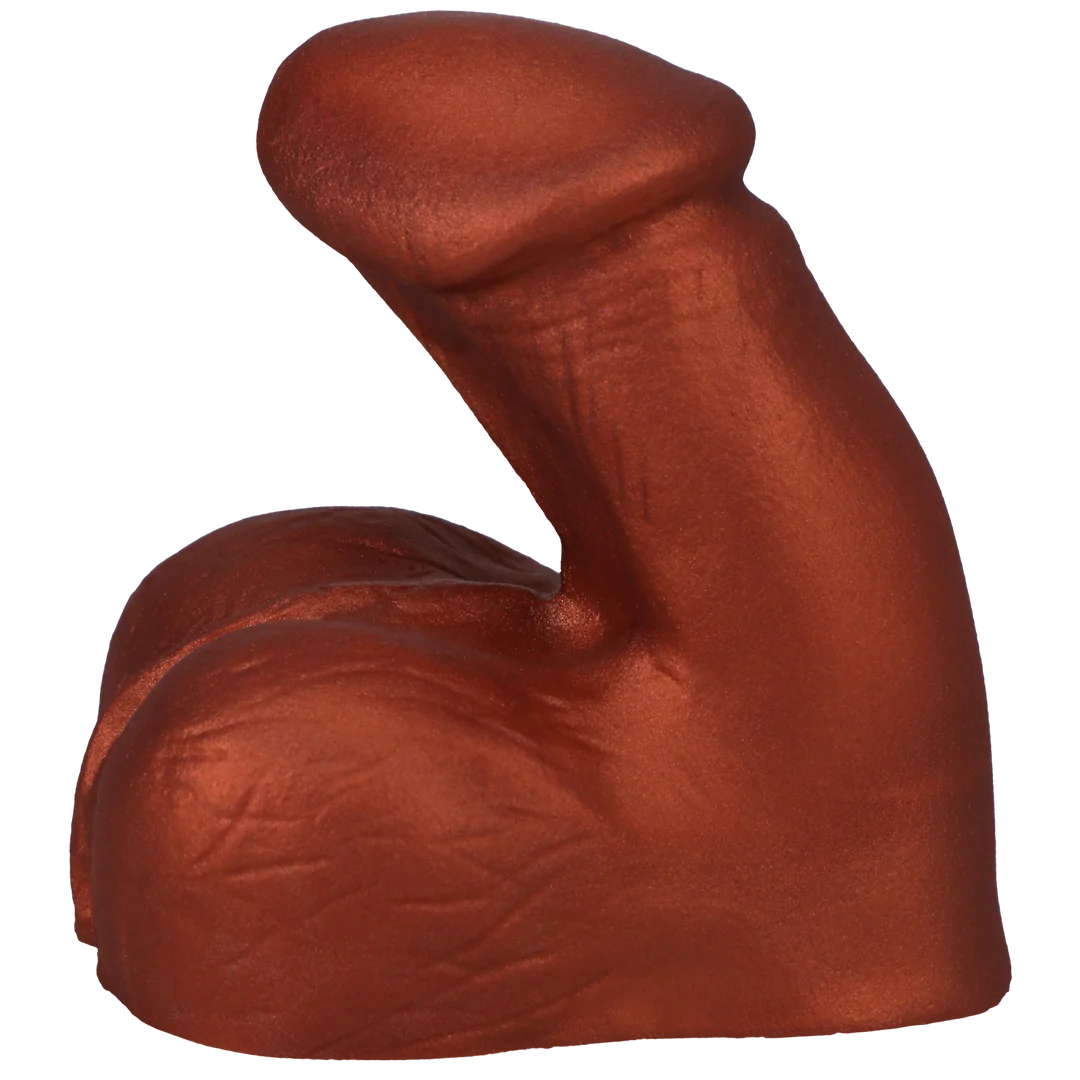 Realistic soft copper silicone packer with a smooth shaft and textured base.