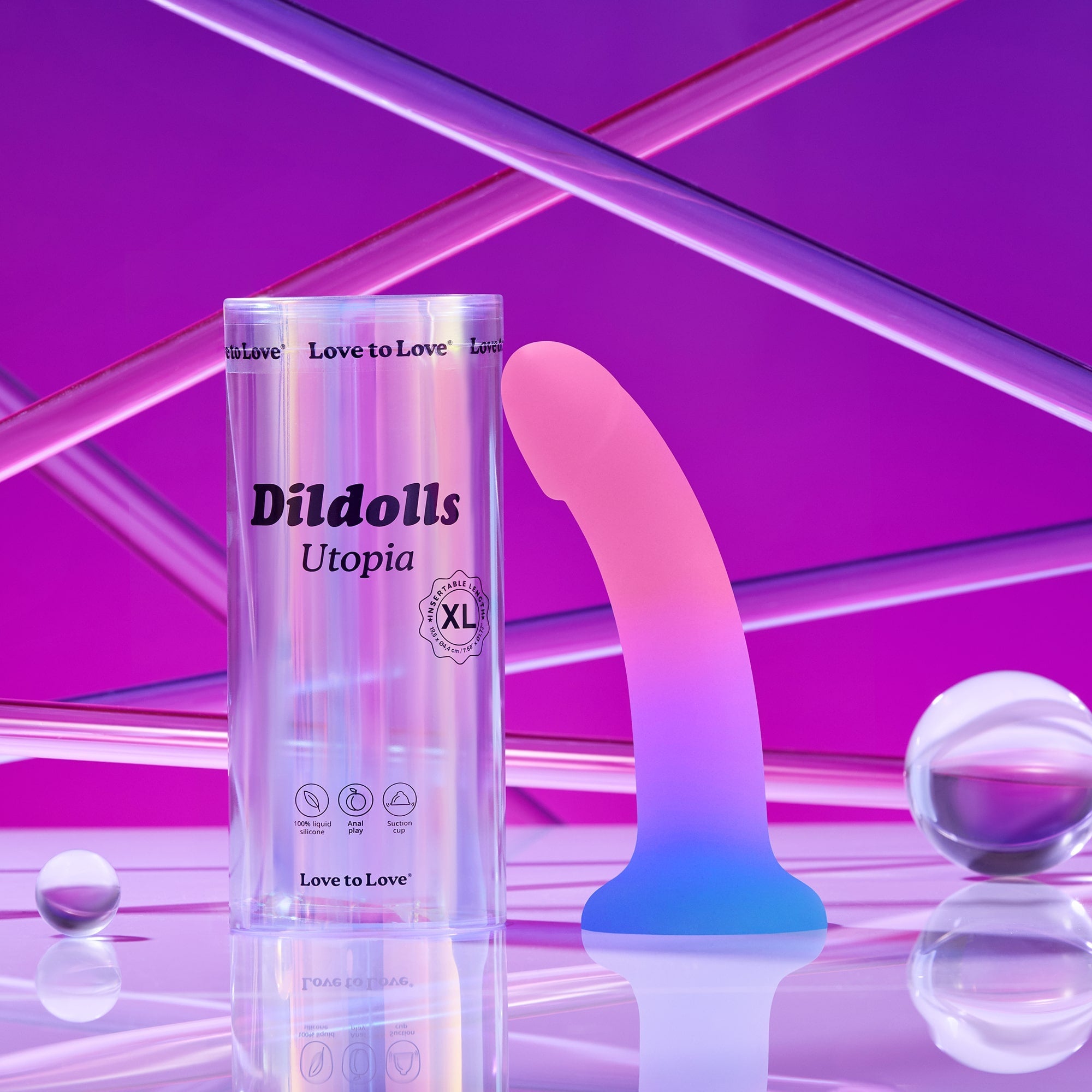 XL curved silicone dildo with suction base in pink and blue gradient.