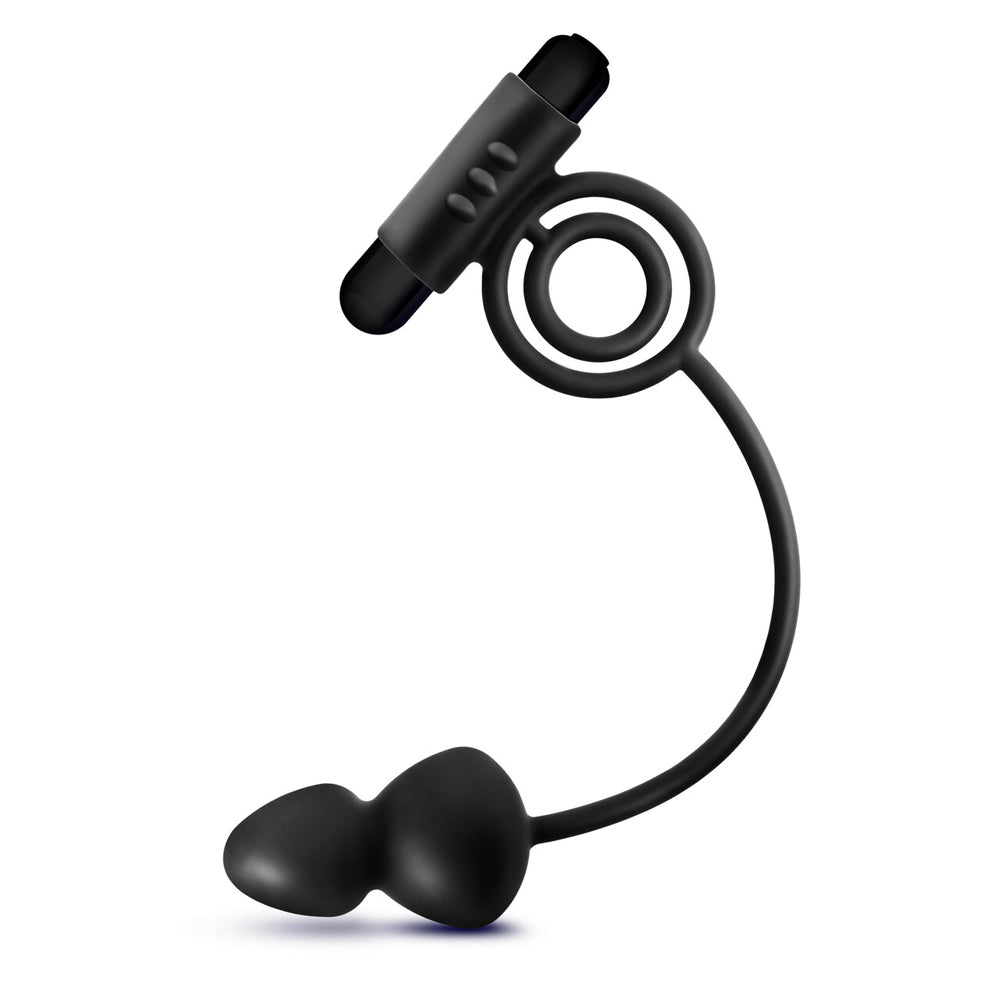 Black silicone anal plug with a vibrating C-ring.