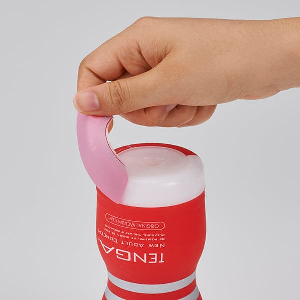Tenga Original Vacuum Cup male masturbator with pink pull tab.