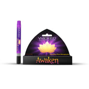 Wicked Awaken clitoral stimulating gel in a purple pen with a black base.