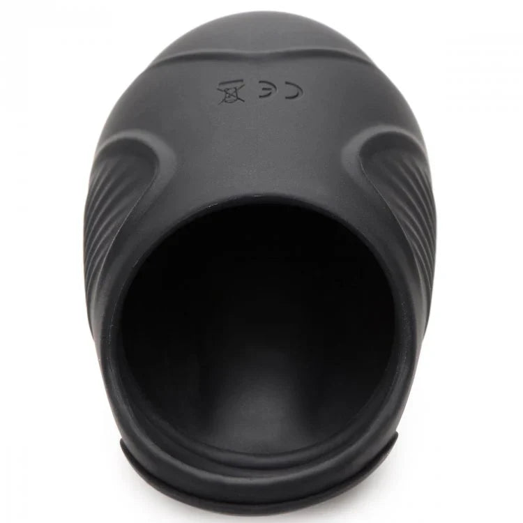 Black vibrating silicone ball sack with ribbed texture and CE marking.