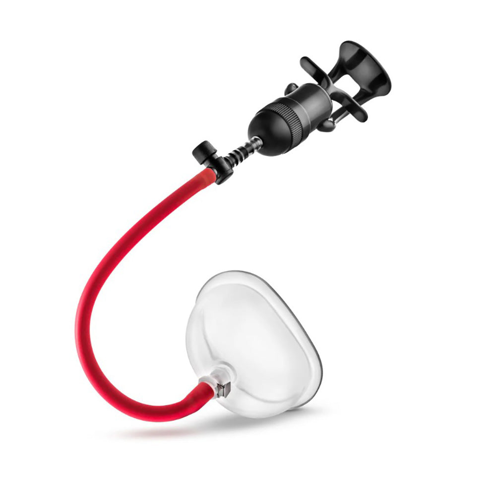 A black pump with a red tube and a clear acrylic cup.