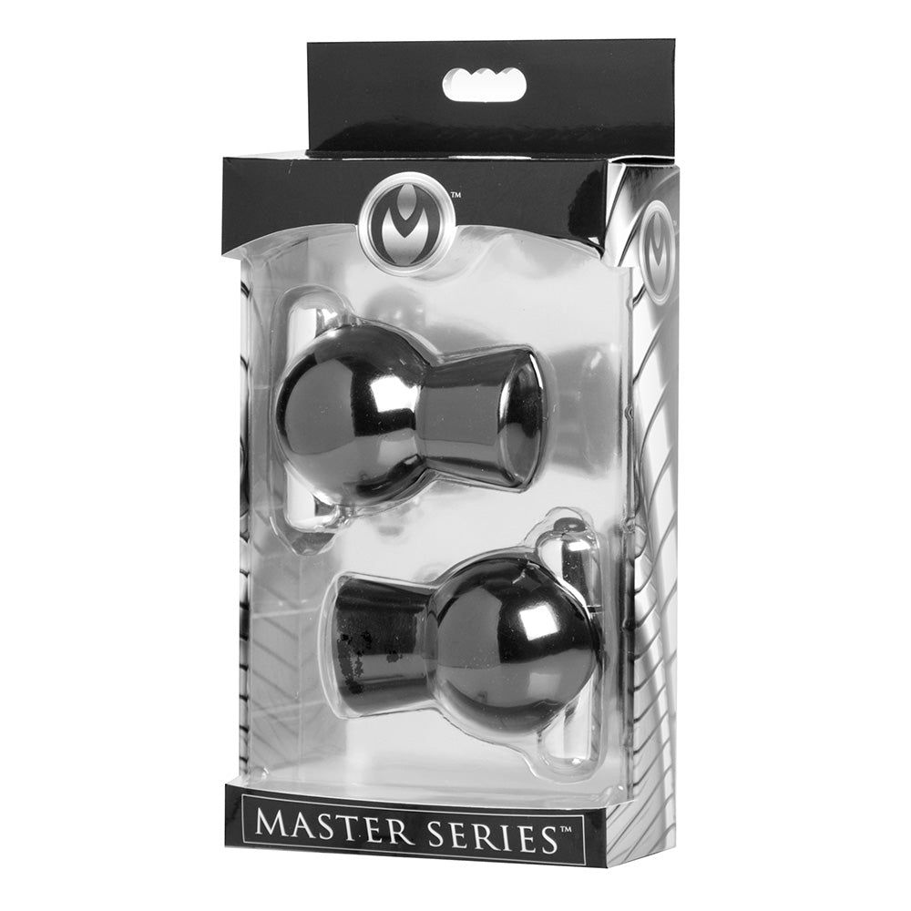 Black vibrating nipple suckers in packaging.
