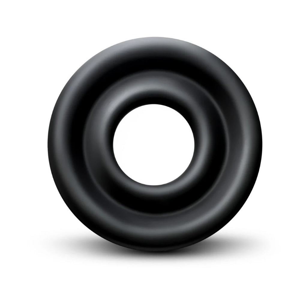 Black silicone pump sleeve with a smooth, rounded shape.