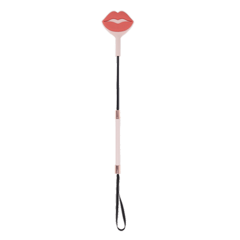 Silicone spanking whip with a pink lip-shaped tip and faux leather handle.