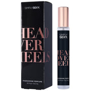 Simply Sexy Head Over Heels pheromone perfume spray with rose gold accents.