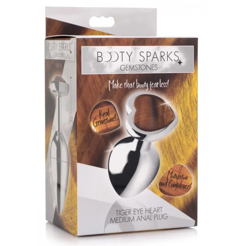 A medium anal plug with a heart-shaped tiger's eye gemstone and aluminum alloy base.