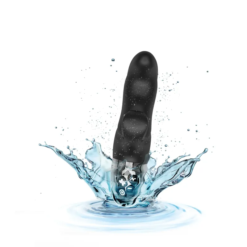 Black silicone dual stimulator vibrator splashing in water.