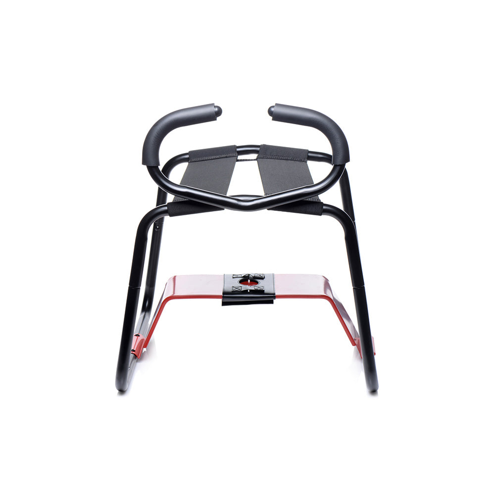 Black and red vibrating dildo bench with handles.
