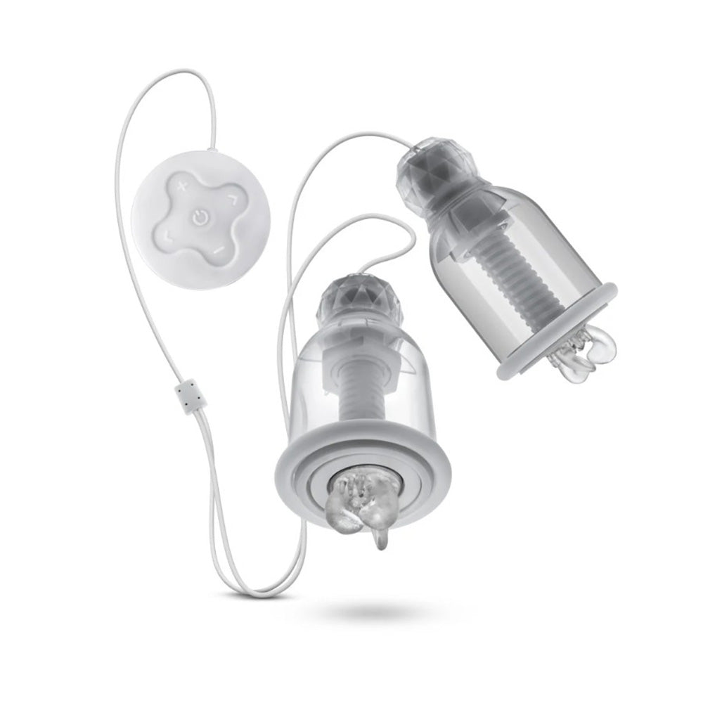 Wearable nipple massager with remote and two stimulating cups.