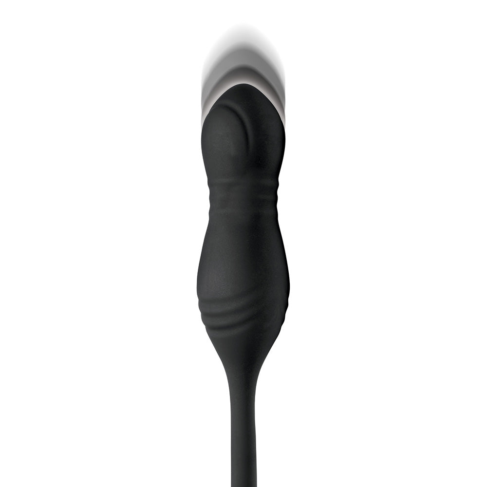 Black anal plug with ribbed taint stimulator and motion blur.