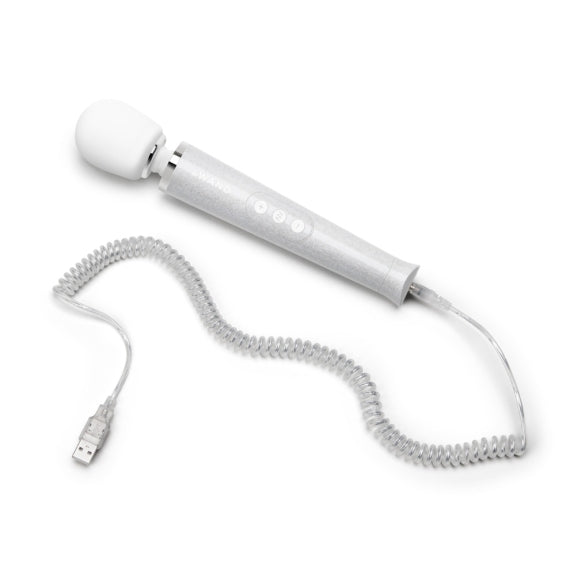 A white wand massager with a coiled USB cord.