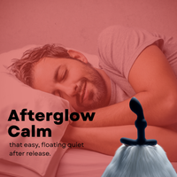 A man sleeps peacefully next to a prostate massager with a fluffy white base.