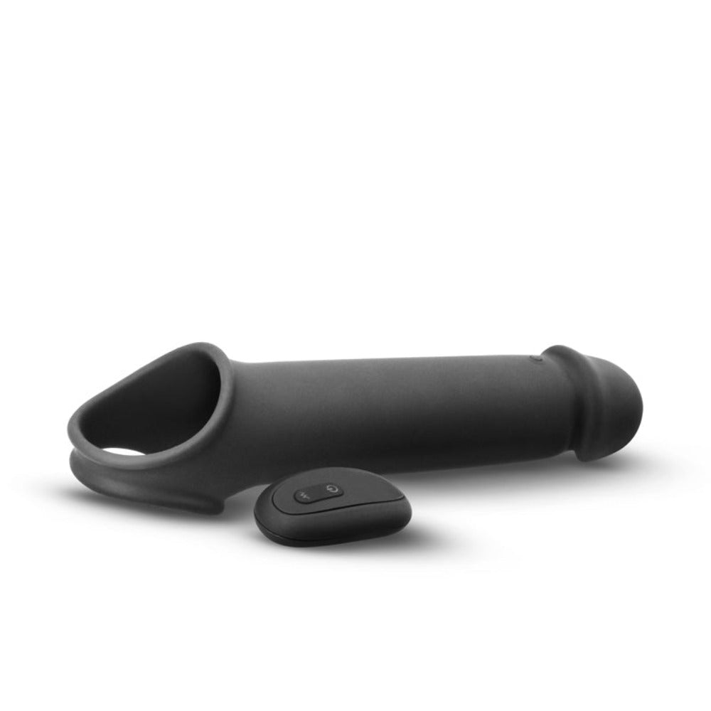 Black silicone vibrating penis extension with a remote control.