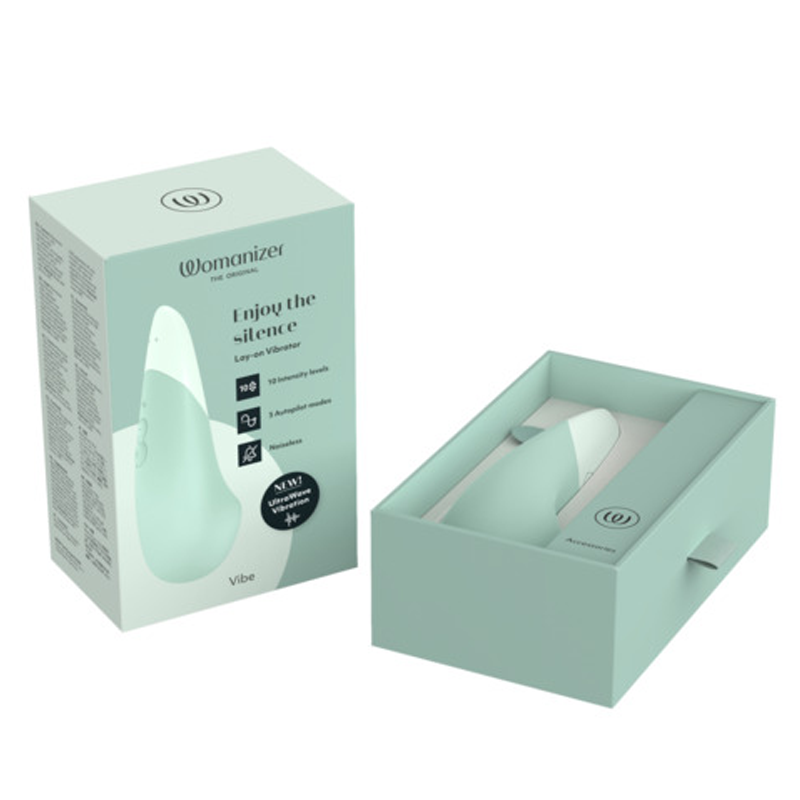 Womanizer Vibe clitoral vibrator in mint green, shown with its box and packaging.
