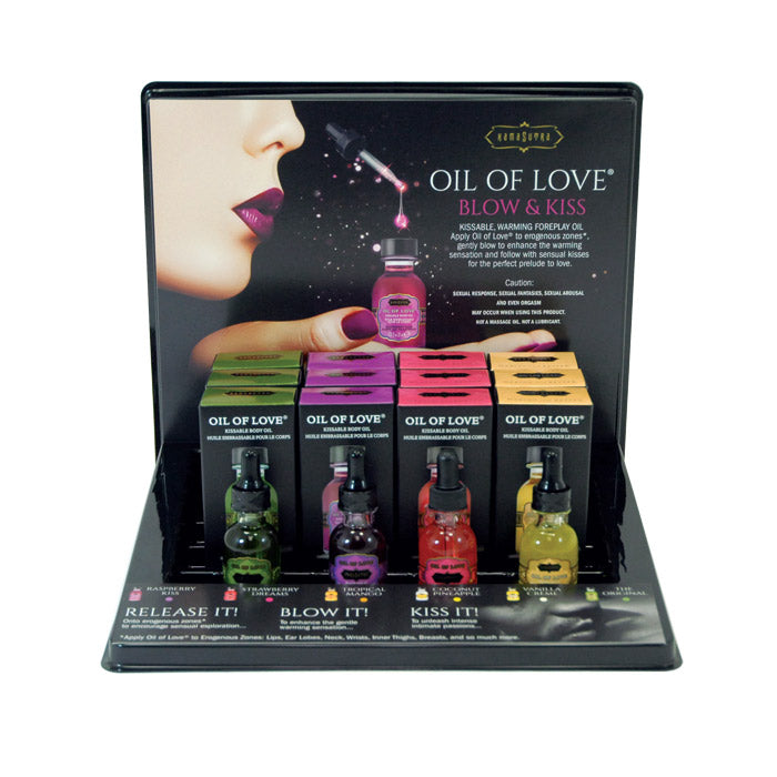 Kama Sutra Oil of Love body oil display set with four tester bottles.