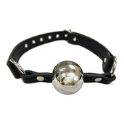Hollow stainless steel ball gag with a black leather strap.
