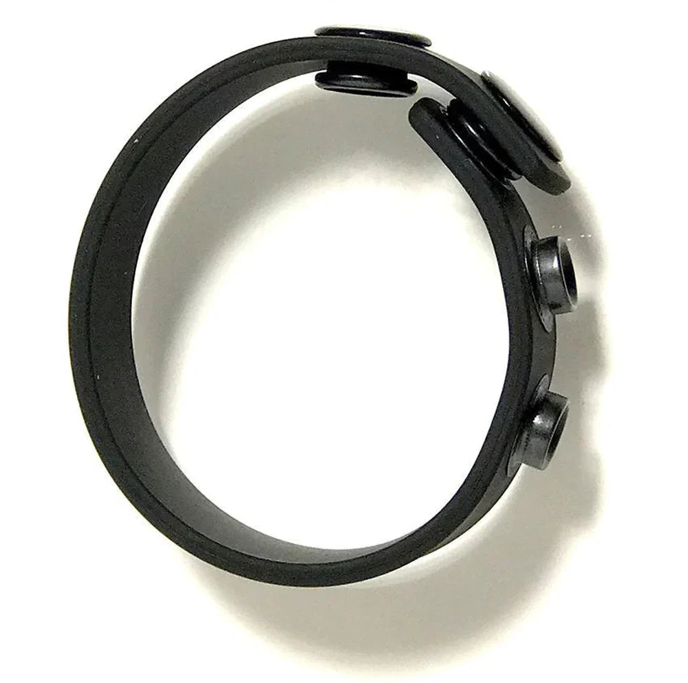 Black adjustable silicone cock strap with three snaps.