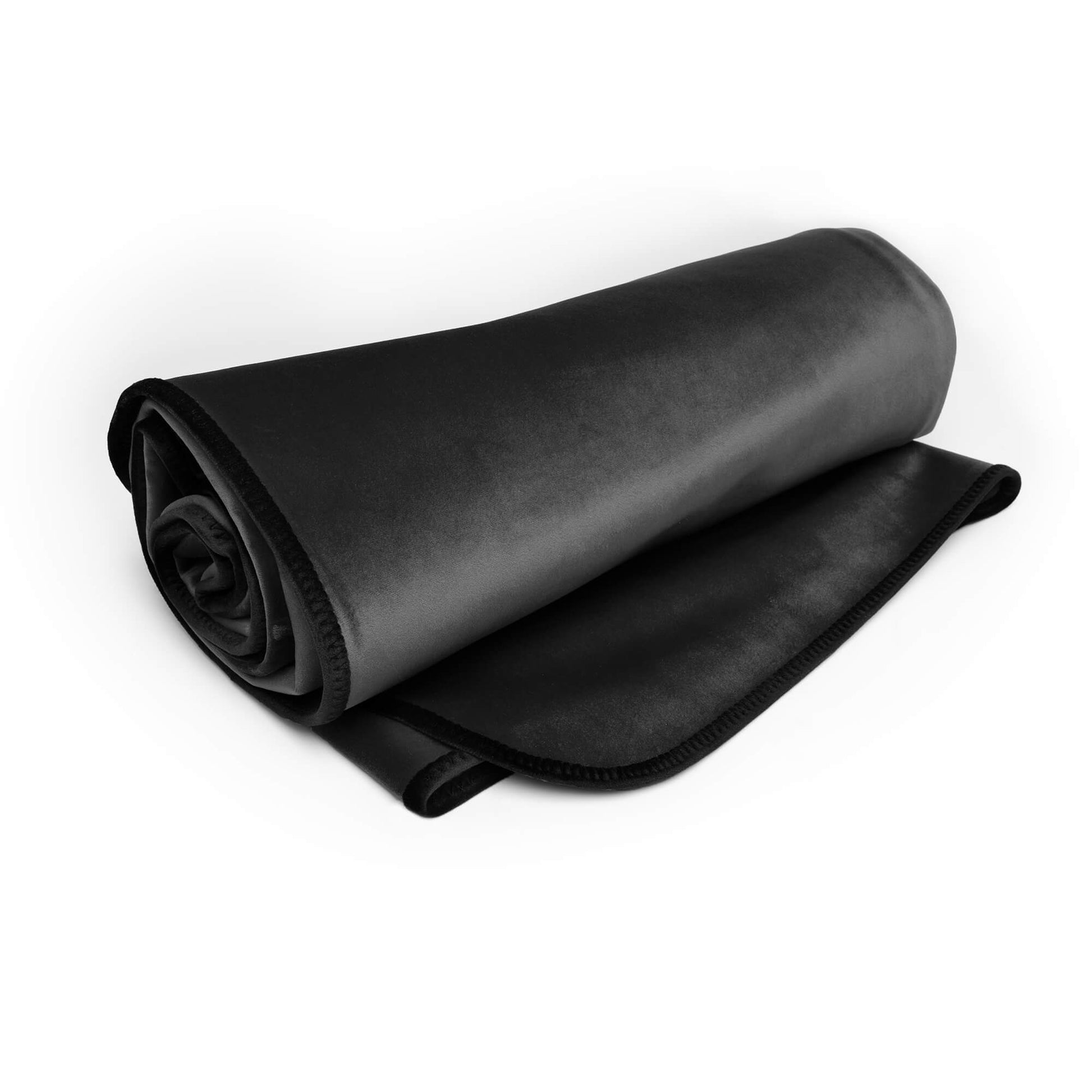 Rolled black waterproof microvelvet throw blanket with a textured edge.