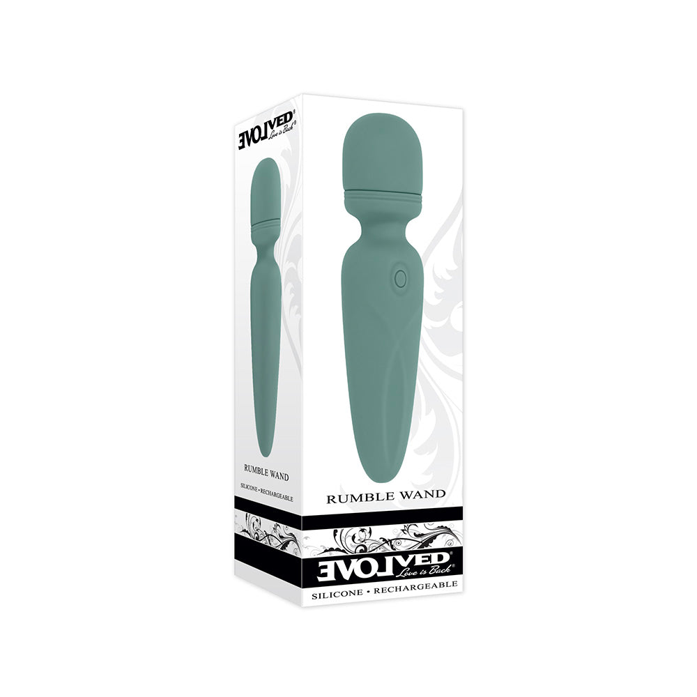 A teal Rumble Wand vibrator in its box, made of silicone and rechargeable.