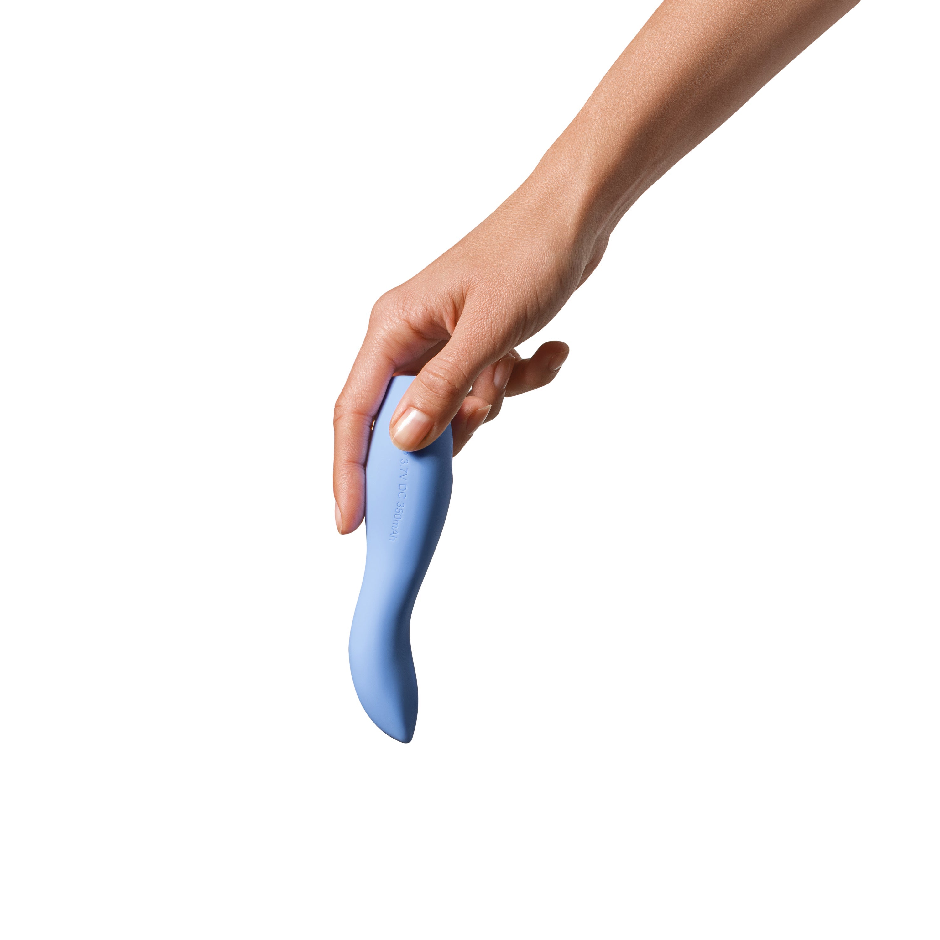 A periwinkle silicone vibrator held by a hand.