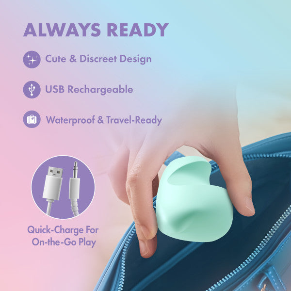 A light green silicone vibrator being placed into a blue bag, with text highlighting its features.