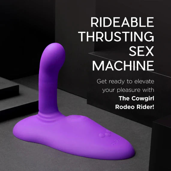 A purple wearable vibrator with a curved head and a wide base.