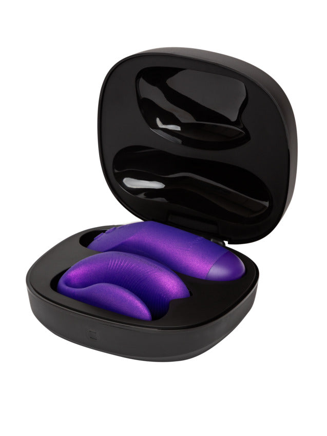 Purple couples vibrator with haptic remote in a black case.