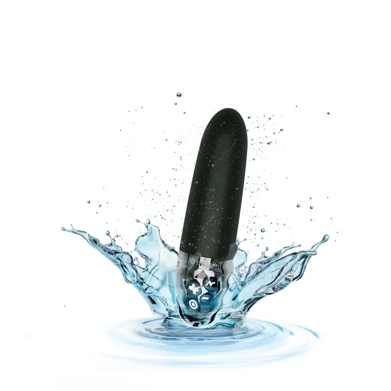 A black vibrator with a silver base is splashing into water.