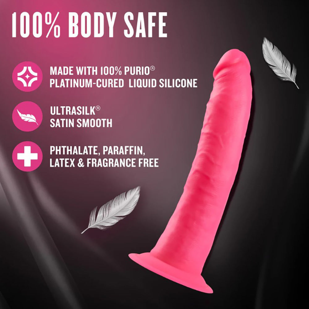 Neon pink dual density silicone dildo with suction cup base.