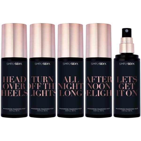 Five bottles of Simply Sexy pheromone fragrance mist with rose gold caps.