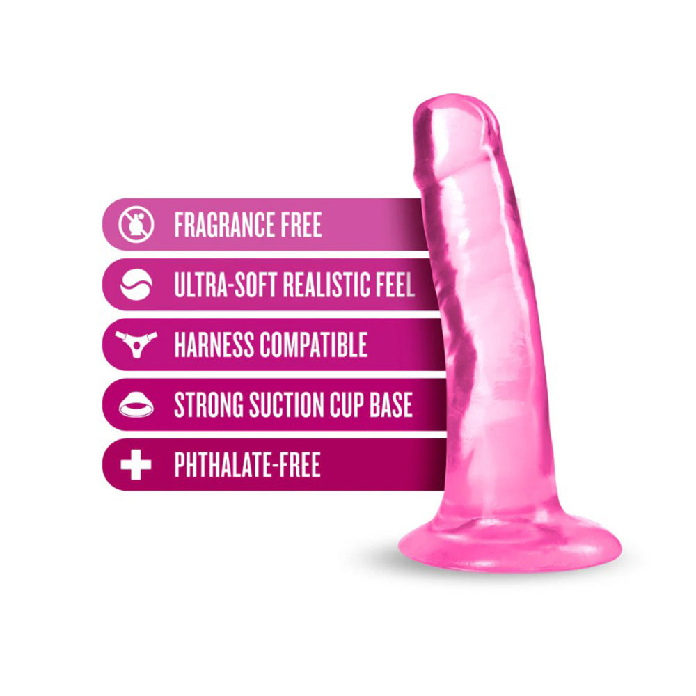 Pink 5.5-inch realistic TPE dildo with suction cup base and harness compatibility.