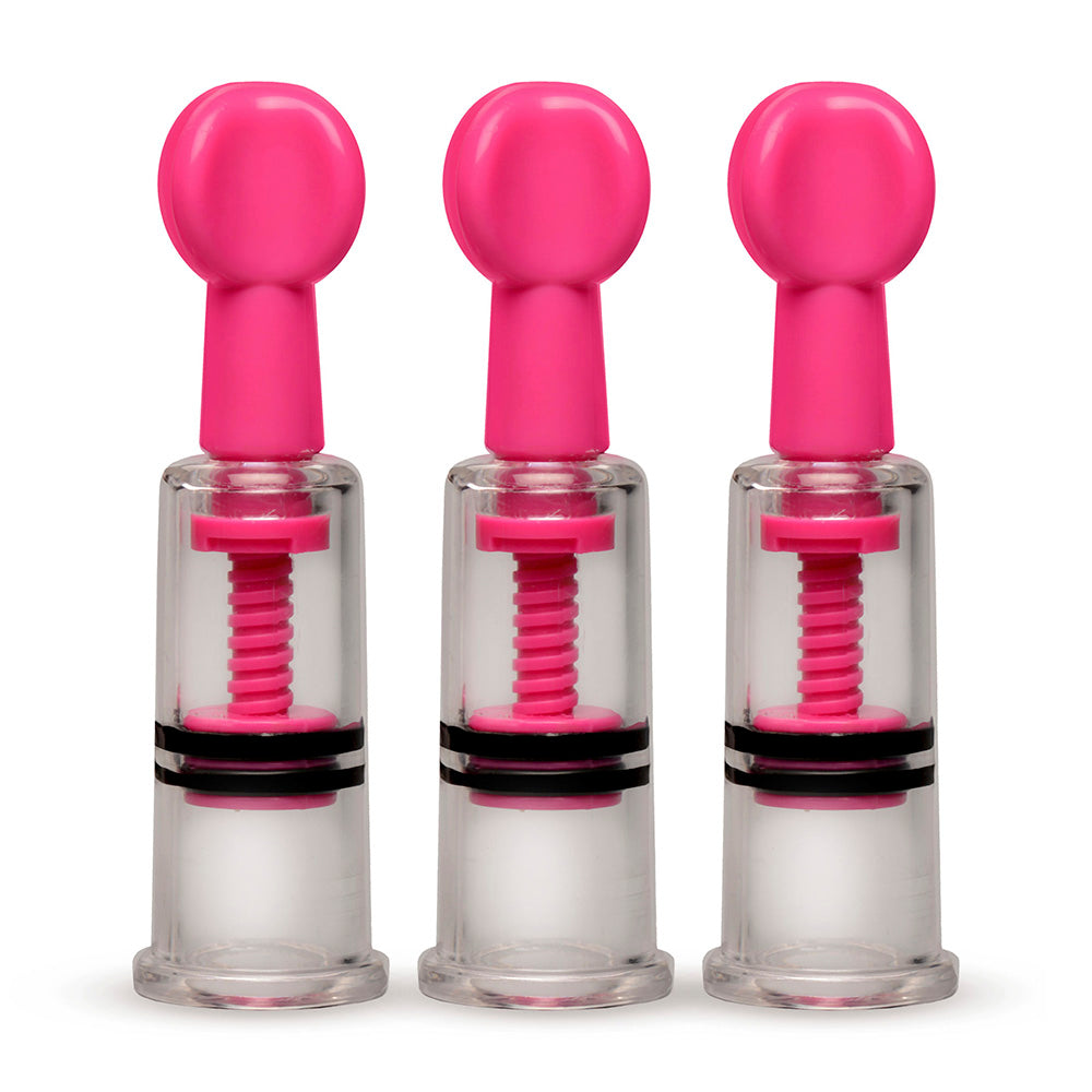 Three pink nipple suckers with clear plastic barrels and adjustable suction.