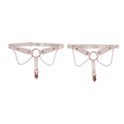 Pearl garter set with faux leather straps, rose gold rings, and pearl chains.